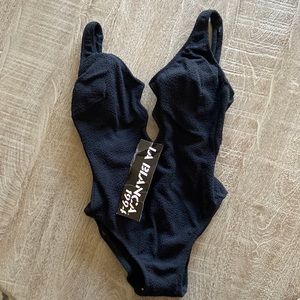 Brand new with tags one piece swim suit size 12
